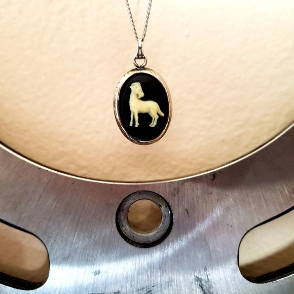 Silver necklace with black & cream Aries pendant - Picture 2 of 3